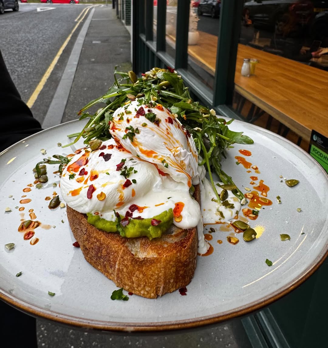 Avocado sourdough with poached eggs at City Sips