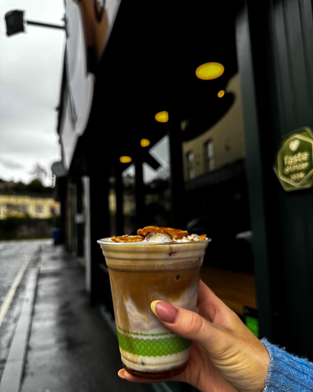 Iced latte outside City Sips