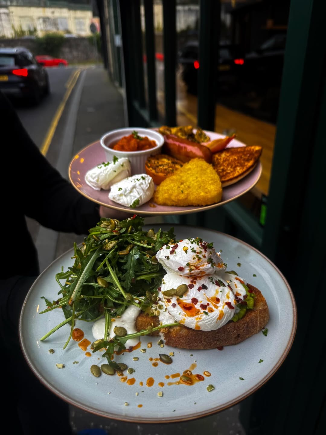 Two brunch plates outside City Sips